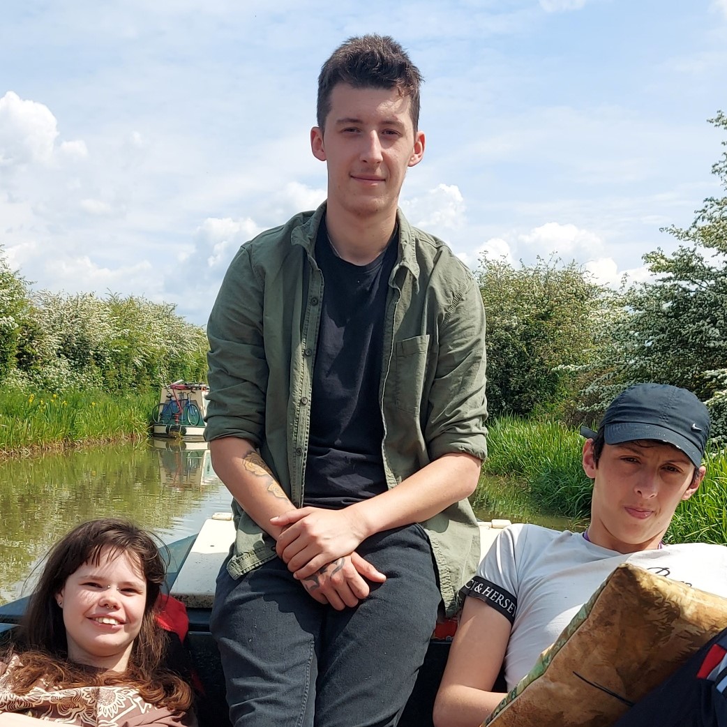 Young woman and two young men on the Mary Rose canal boat